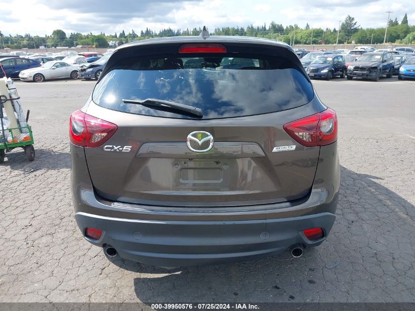 2016 Mazda Cx-5 Touring VIN: JM3KE2CY0G0863311 Lot: 39950576