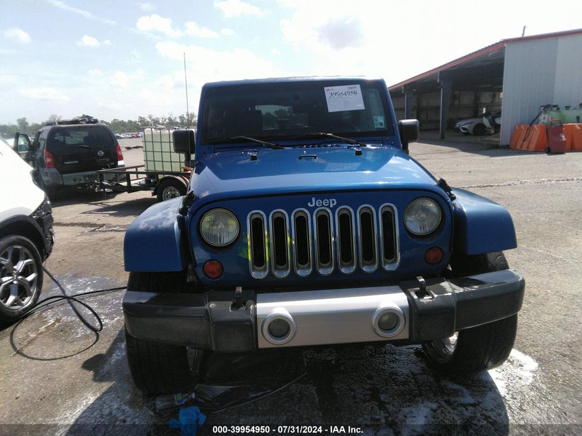 2009 Jeep Wrangler Unlimited Sahara VIN: 1J4GA591X9L741234 Lot: 39954950