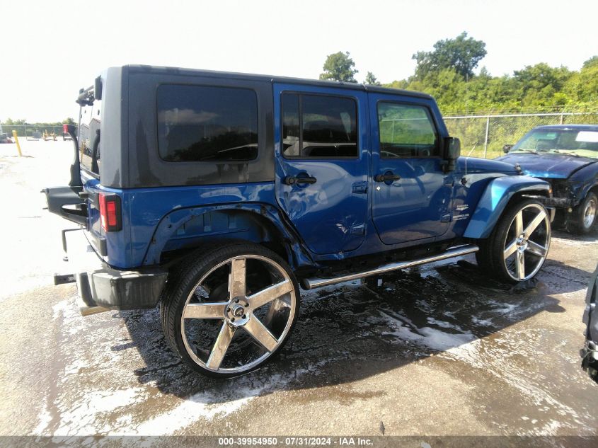 2009 Jeep Wrangler Unlimited Sahara VIN: 1J4GA591X9L741234 Lot: 39954950