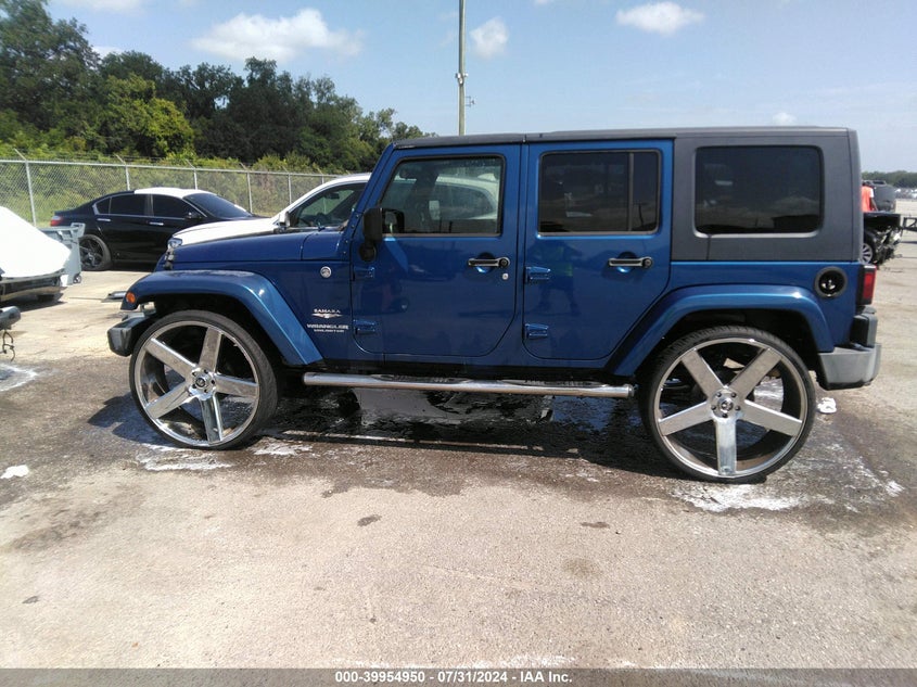 2009 Jeep Wrangler Unlimited Sahara VIN: 1J4GA591X9L741234 Lot: 39954950