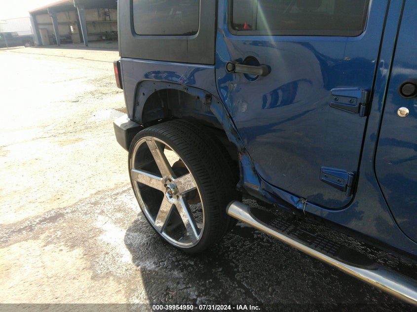 2009 Jeep Wrangler Unlimited Sahara VIN: 1J4GA591X9L741234 Lot: 39954950