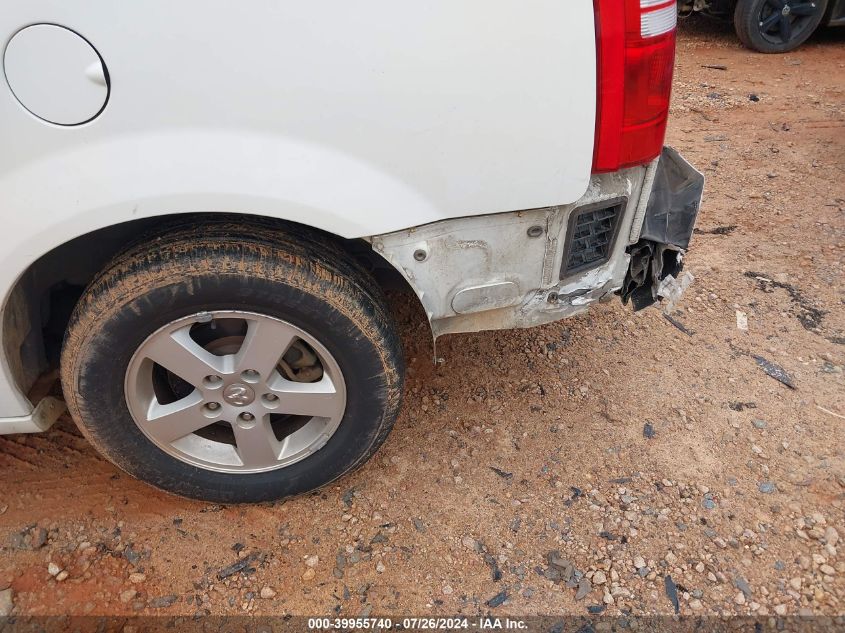 2010 Dodge Grand Caravan Sxt VIN: 2D4RN5D13AR196731 Lot: 39955740