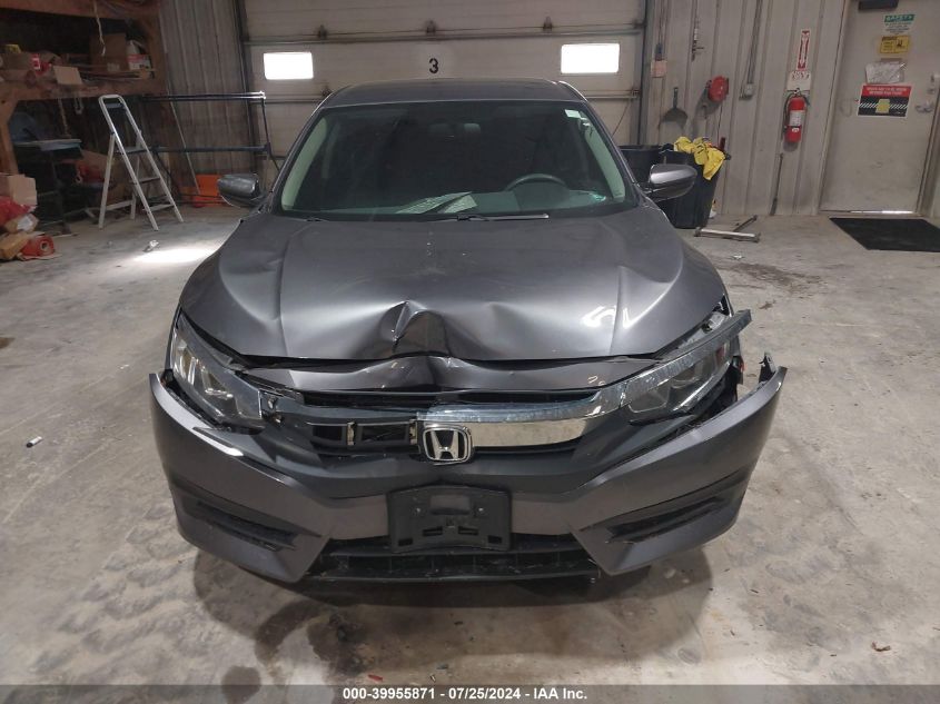 2018 Honda Civic Lx VIN: 19XFC2F52JE039584 Lot: 39955871