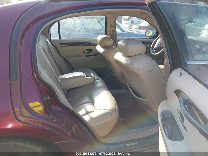 1999 Lincoln Town Car Cartier VIN: 1LNHM83W9XY671440 Lot: 39958279