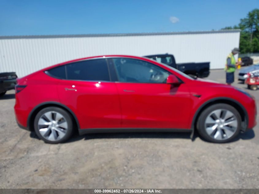 2023 Tesla Model Y Awd/Long Range Dual Motor All-Wheel Drive VIN: 7SAYGDEE6PA025779 Lot: 39962452