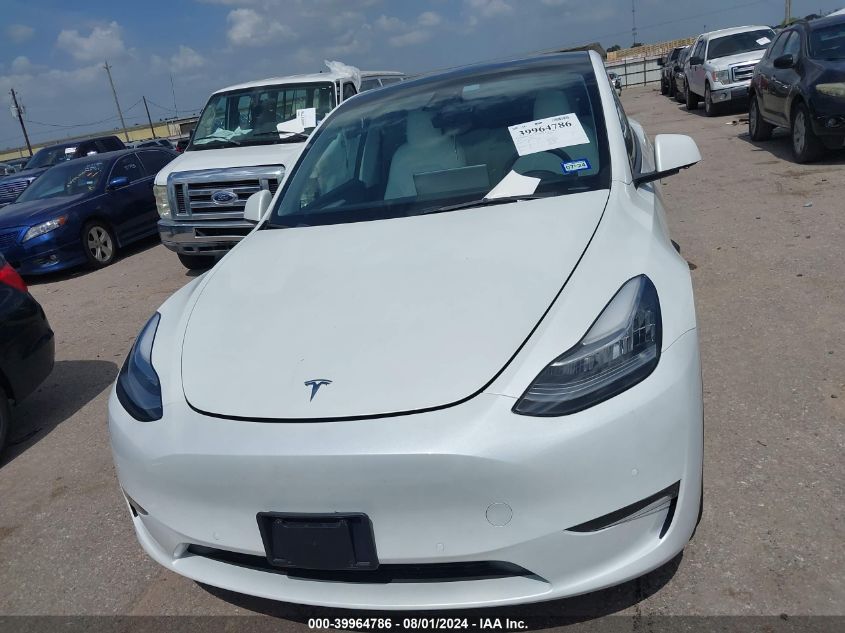 2022 Tesla Model Y Long Range Dual Motor All-Wheel Drive VIN: 7SAYGAEE6NF574803 Lot: 39964786