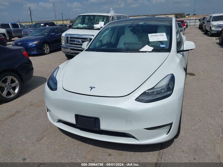 2022 Tesla Model Y Long Range Dual Motor All-Wheel Drive VIN: 7SAYGAEE6NF574803 Lot: 39964786