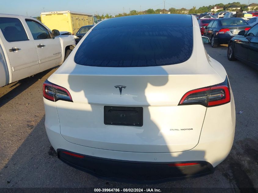 2022 Tesla Model Y Long Range Dual Motor All-Wheel Drive VIN: 7SAYGAEE6NF574803 Lot: 39964786