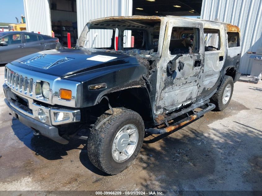 2003 Hummer H2 VIN: 5GRGN23U63H129018 Lot: 39966209