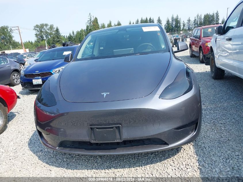 2023 Tesla Model Y Awd/Long Range Dual Motor All-Wheel Drive VIN: 7SAYGDEE9PF614702 Lot: 39966516