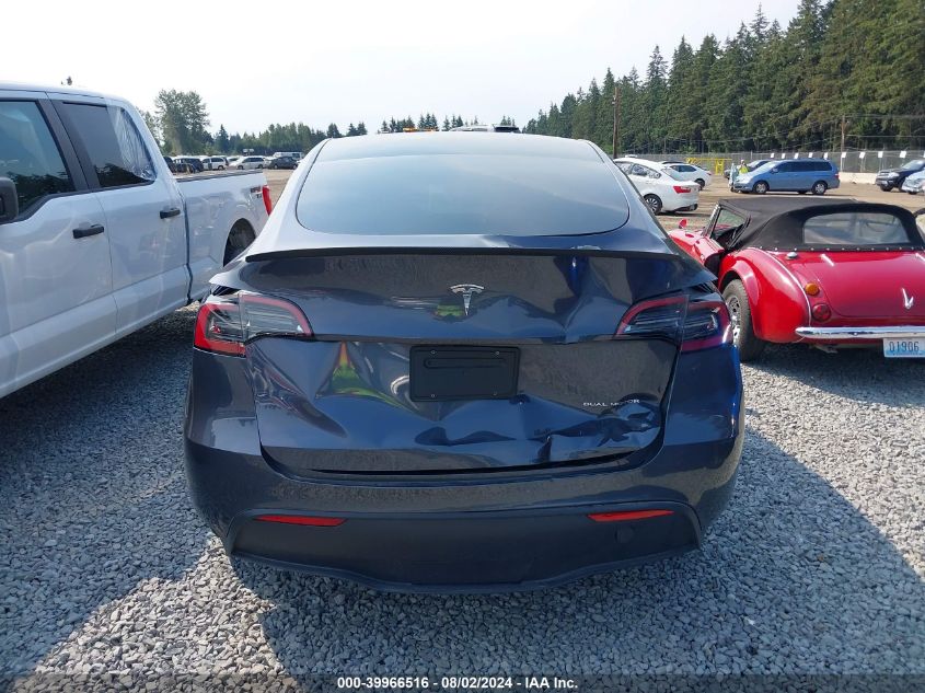 2023 Tesla Model Y Awd/Long Range Dual Motor All-Wheel Drive VIN: 7SAYGDEE9PF614702 Lot: 39966516