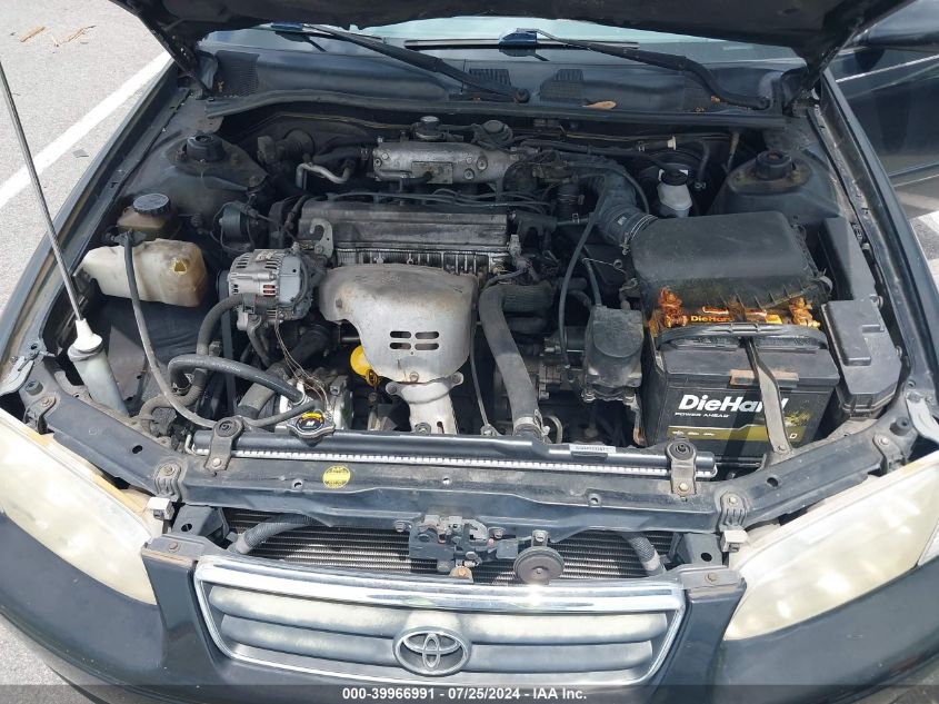 2000 Toyota Camry Le VIN: JT2BG22K0Y0398619 Lot: 39966991