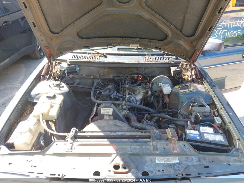 1990 Volvo 240 Dl VIN: YV1AA884XL1397409 Lot: 39971055
