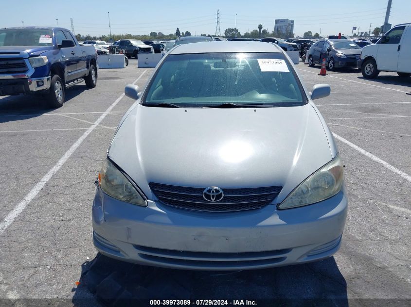 2003 Toyota Camry Le V6 VIN: 4T1BF32K73U048868 Lot: 39973089
