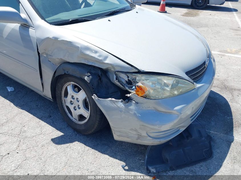 2003 Toyota Camry Le V6 VIN: 4T1BF32K73U048868 Lot: 39973089