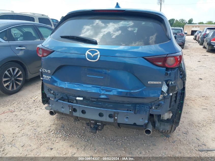 2021 Mazda Cx-5 Touring VIN: JM3KFACM5M0303560 Lot: 39974337