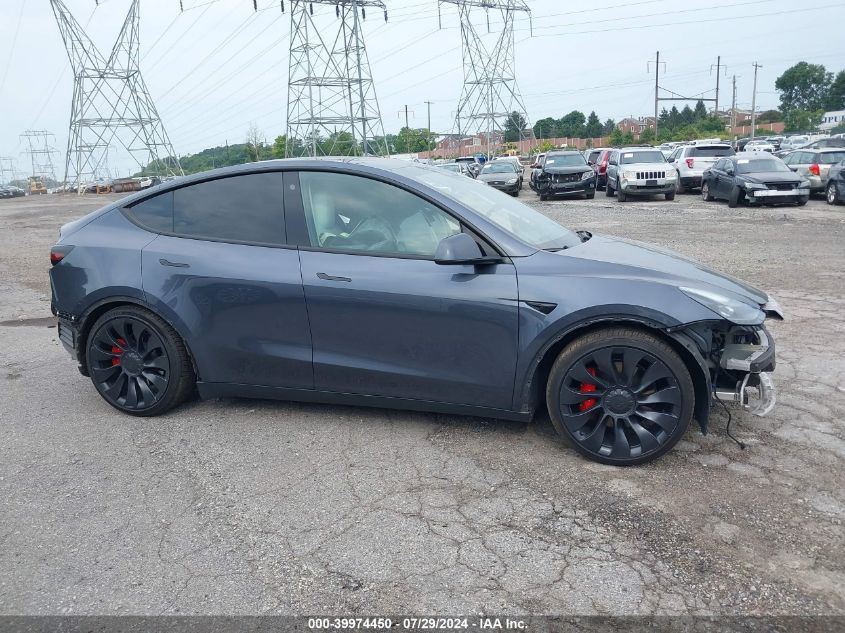 2023 Tesla Model Y VIN: 7SAYGDEF1PF712874 Lot: 39974450