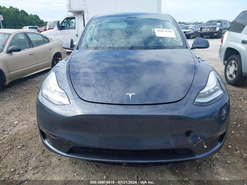 2023 Tesla Model Y Awd/Long Range Dual Motor All-Wheel Drive VIN: 7SAYGDEE6PA161314 Lot: 39974519