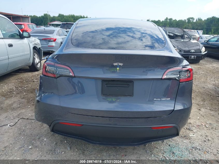 2023 Tesla Model Y Awd/Long Range Dual Motor All-Wheel Drive VIN: 7SAYGDEE6PA161314 Lot: 39974519