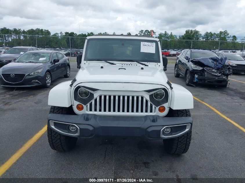 2012 Jeep Wrangler Unlimited Sahara VIN: 1C4BJWEG7CL153654 Lot: 39975171