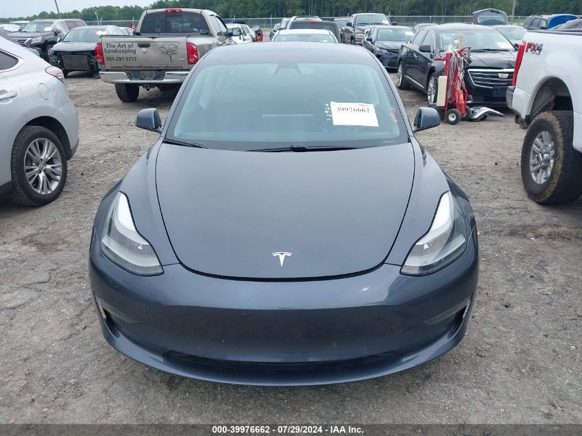 2021 Tesla Model 3 VIN: 5YJ3E1EB6MF869322 Lot: 39976662