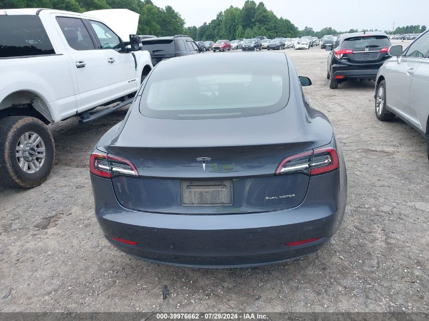 2021 Tesla Model 3 VIN: 5YJ3E1EB6MF869322 Lot: 39976662