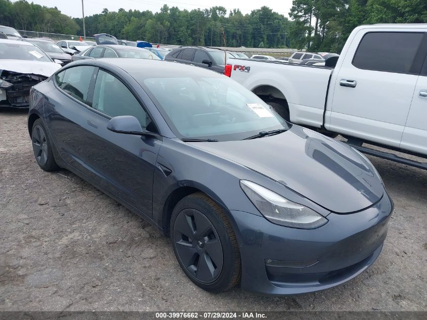 2021 Tesla Model 3 VIN: 5YJ3E1EB6MF869322 Lot: 39976662