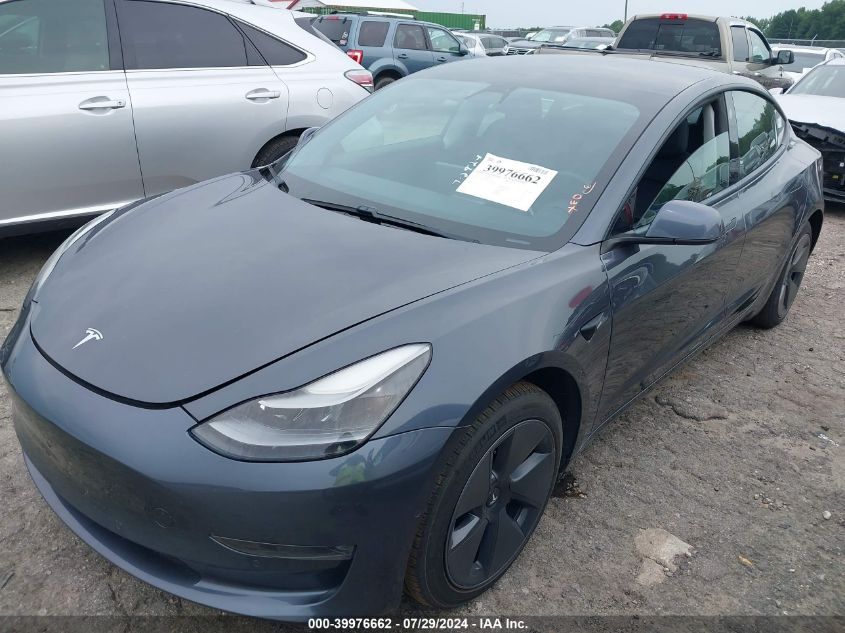 2021 Tesla Model 3 VIN: 5YJ3E1EB6MF869322 Lot: 39976662