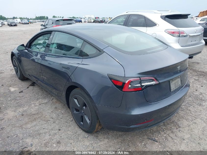 2021 Tesla Model 3 VIN: 5YJ3E1EB6MF869322 Lot: 39976662