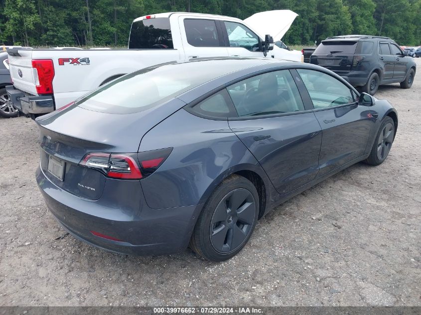 2021 Tesla Model 3 VIN: 5YJ3E1EB6MF869322 Lot: 39976662