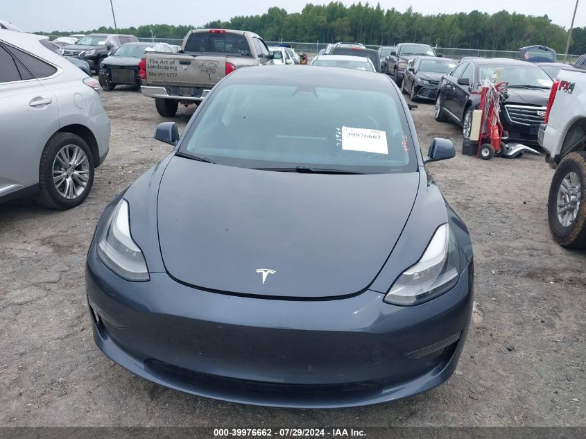 2021 Tesla Model 3 VIN: 5YJ3E1EB6MF869322 Lot: 39976662