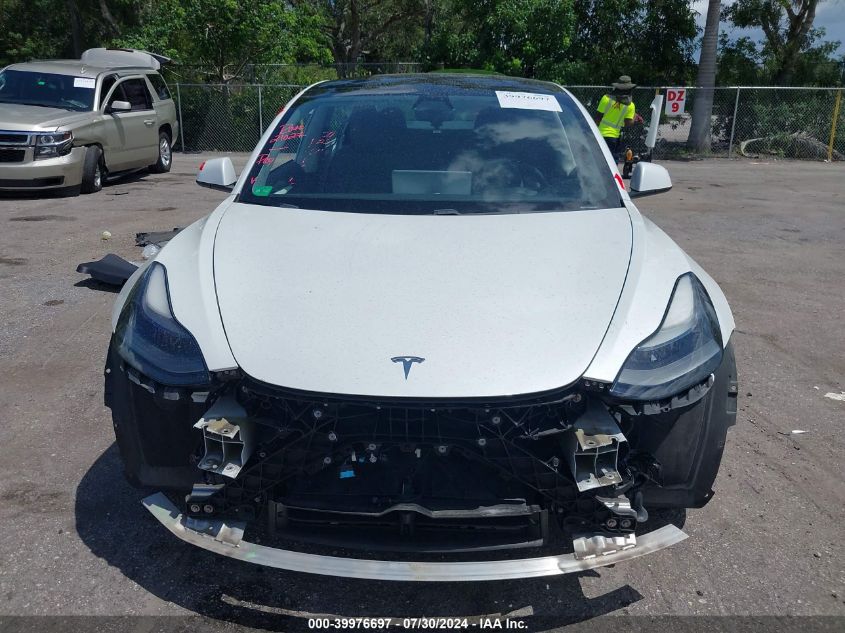 2021 Tesla Model 3 Standard Range Plus Rear-Wheel Drive VIN: 5YJ3E1EA6MF020847 Lot: 39976697