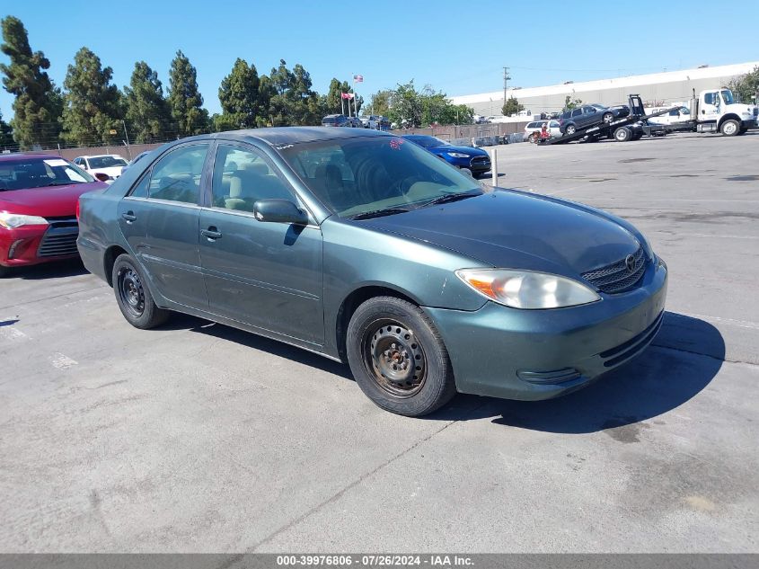 2003 Toyota Camry Le VIN: 4T1BE30K23U757701 Lot: 39976806