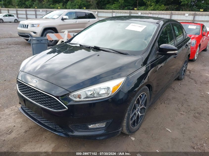 2016 Ford Focus Se VIN: 1FADP3F24GL393457 Lot: 39977102