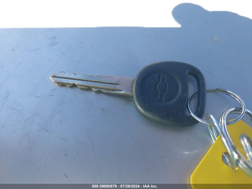 2004 Chevrolet Tahoe Lt VIN: 1GNEC13TX4J305263 Lot: 39980579