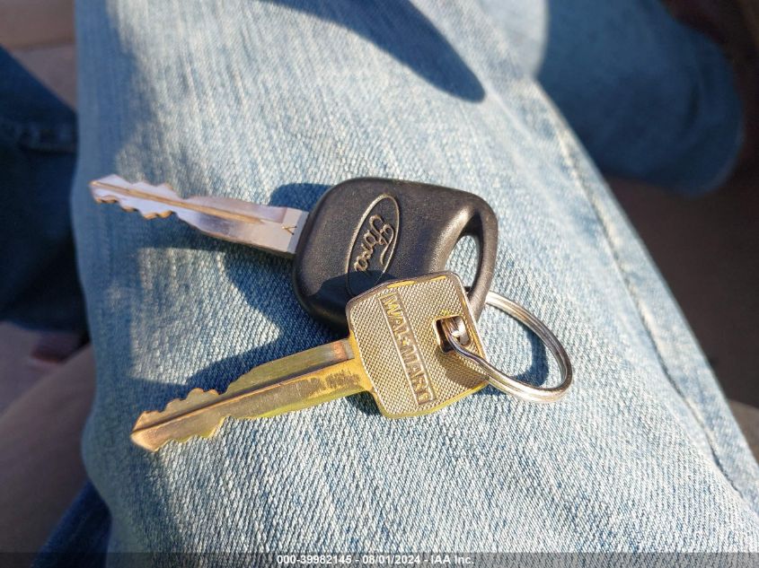 1998 Ford Contour Lx VIN: 1FAFP663XWK299400 Lot: 39982145