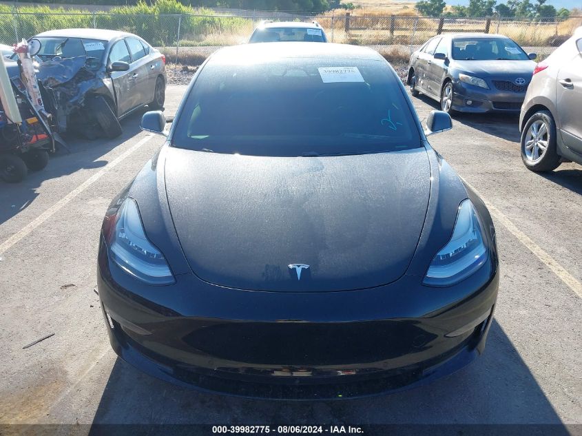 2018 Tesla Model 3 Long Range/Performance VIN: 5YJ3E1EBXJF103296 Lot: 39982775