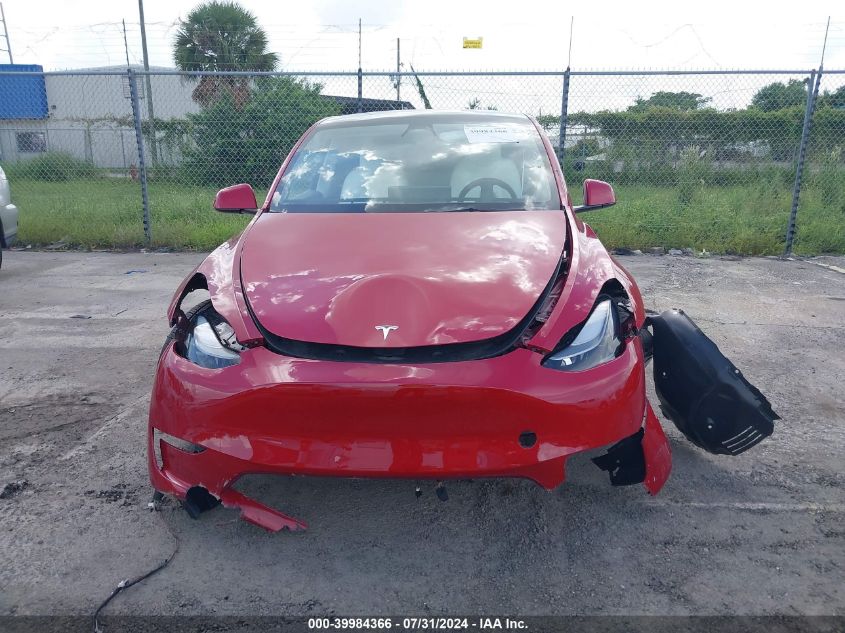 2023 Tesla Model Y Awd/Performance Dual Motor All-Wheel Drive VIN: 7SAYGDEF7PF700860 Lot: 39984366