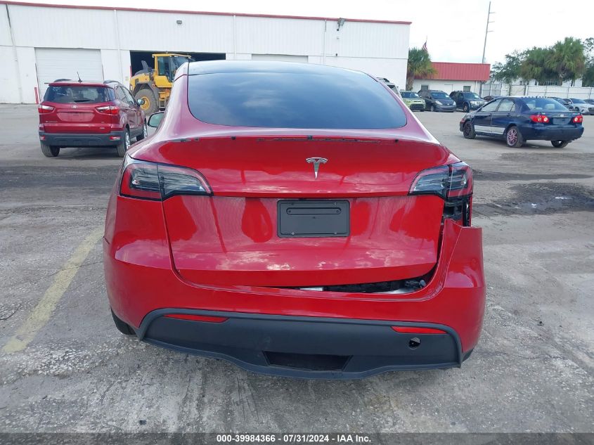 2023 Tesla Model Y Awd/Performance Dual Motor All-Wheel Drive VIN: 7SAYGDEF7PF700860 Lot: 39984366