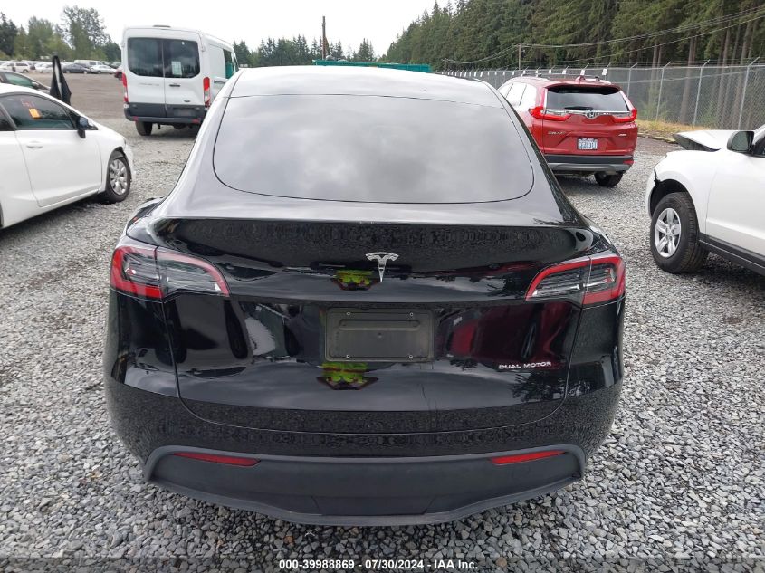 2023 Tesla Model Y Awd/Long Range Dual Motor All-Wheel Drive VIN: 7SAYGAEE8PF808782 Lot: 39988869