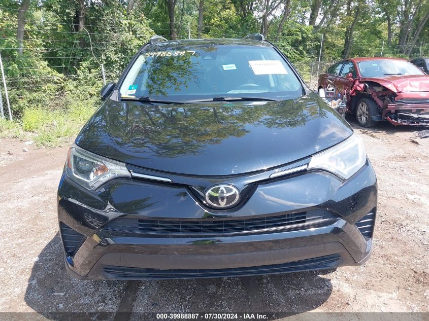 2018 Toyota Rav4 Le VIN: 2T3ZFREV7JW464348 Lot: 39988887