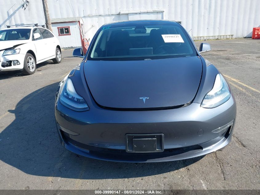 2018 Tesla Model 3 Long Range/Performance VIN: 5YJ3E1EBXJF103797 Lot: 39990147