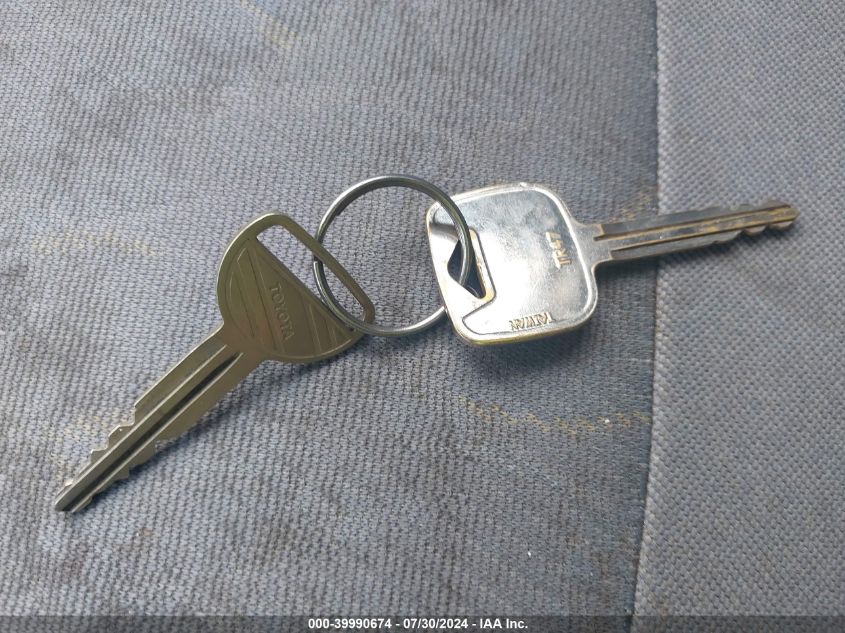 2003 Toyota Echo VIN: JTDBT123330295726 Lot: 39990674