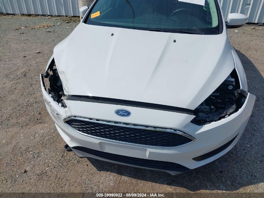 2018 Ford Focus Se VIN: 1FADP3F29JL262130 Lot: 39990922