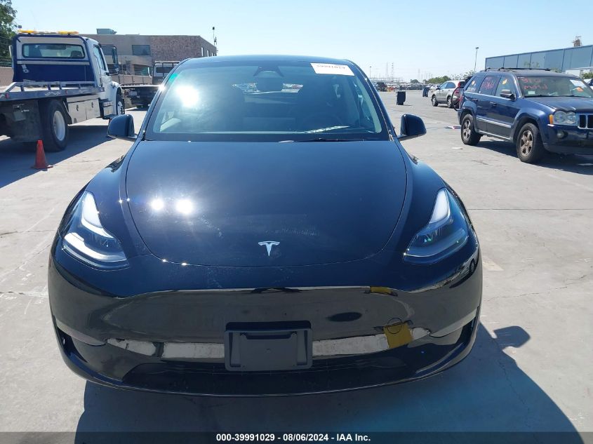 2024 Tesla Model Y Long Range Dual Motor All-Wheel Drive VIN: 7SAYGDEE4RF981655 Lot: 39991029