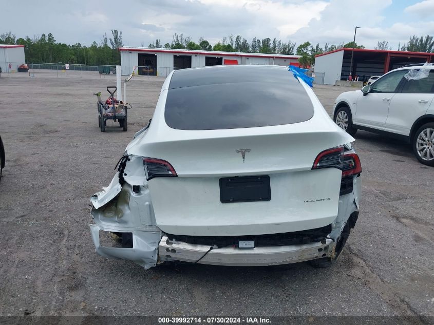 2023 Tesla Model Y Awd/Long Range Dual Motor All-Wheel Drive VIN: 7SAYGDEE3PA089178 Lot: 39992714