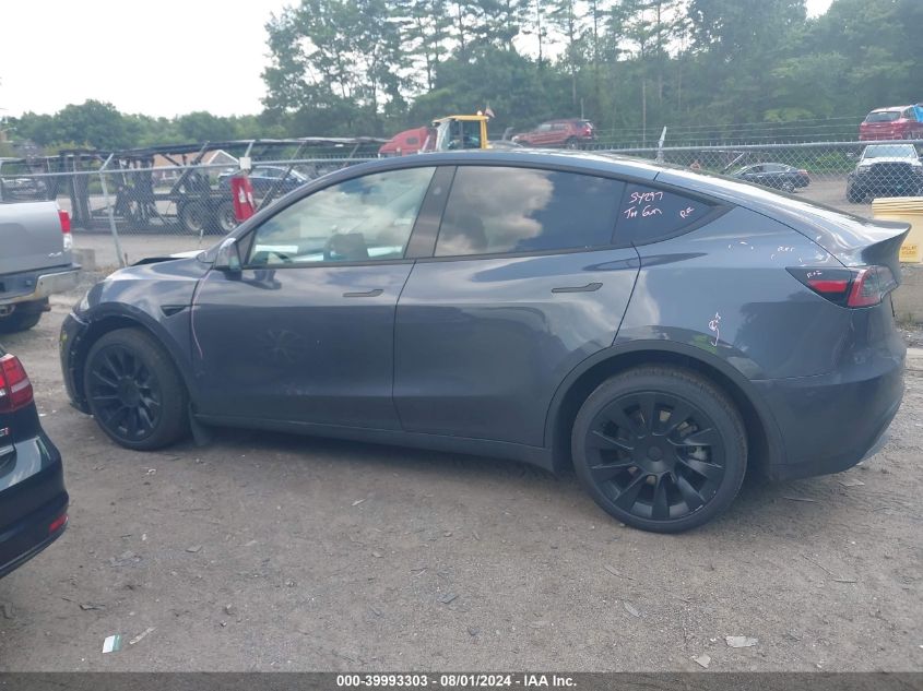 2023 Tesla Model Y Awd/Long Range Dual Motor All-Wheel Drive VIN: 7SAYGAEE1PF852297 Lot: 39993303