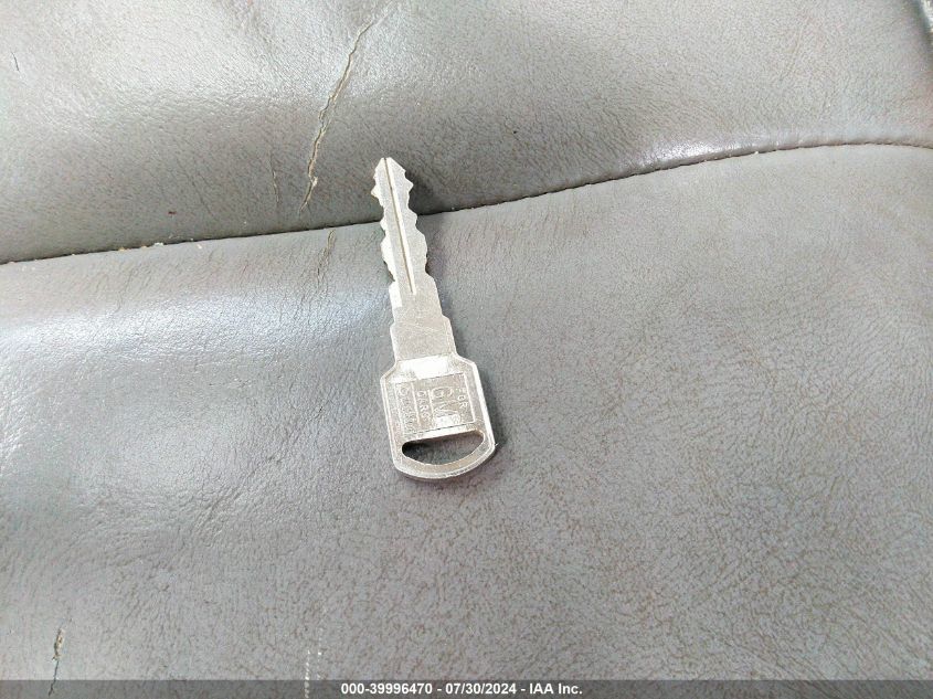 2004 Chevrolet Suburban 1500 Lt VIN: 1GNFK16TX4J206249 Lot: 39996470