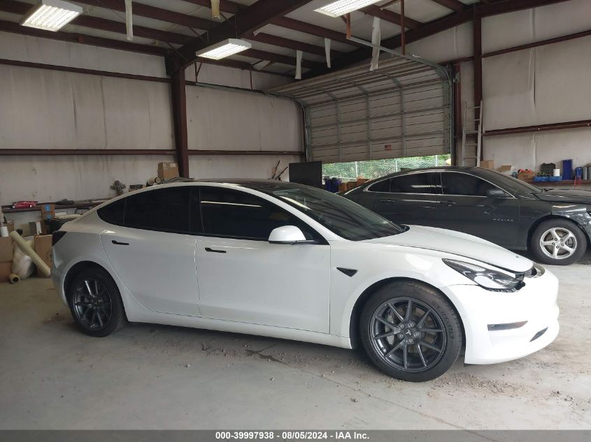 2021 Tesla Model 3 Standard Range Plus Rear-Wheel Drive VIN: 5YJ3E1EA0MF939534 Lot: 39997938