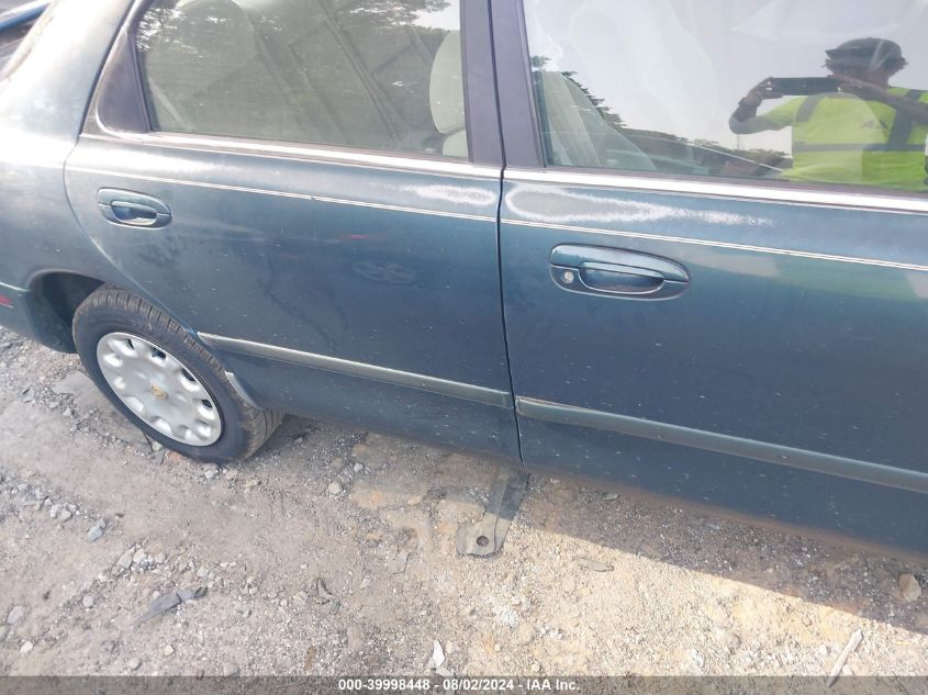 1995 Mazda 626 Dx/Lx VIN: 1YVGE22C9S5344719 Lot: 39998448